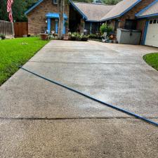 Solar panel driveway cleaning