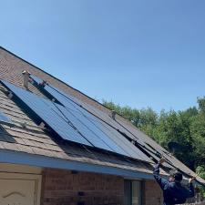 Solar panel driveway cleaning