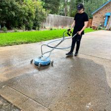 Solar panel driveway cleaning